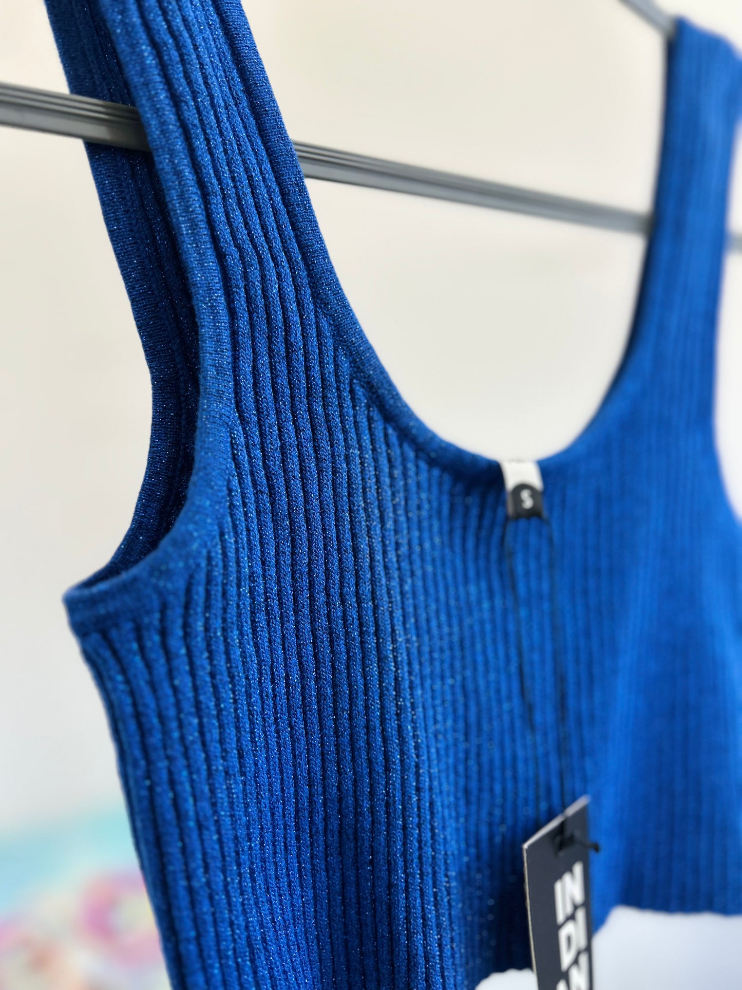 Top brillos con etiqueta TS