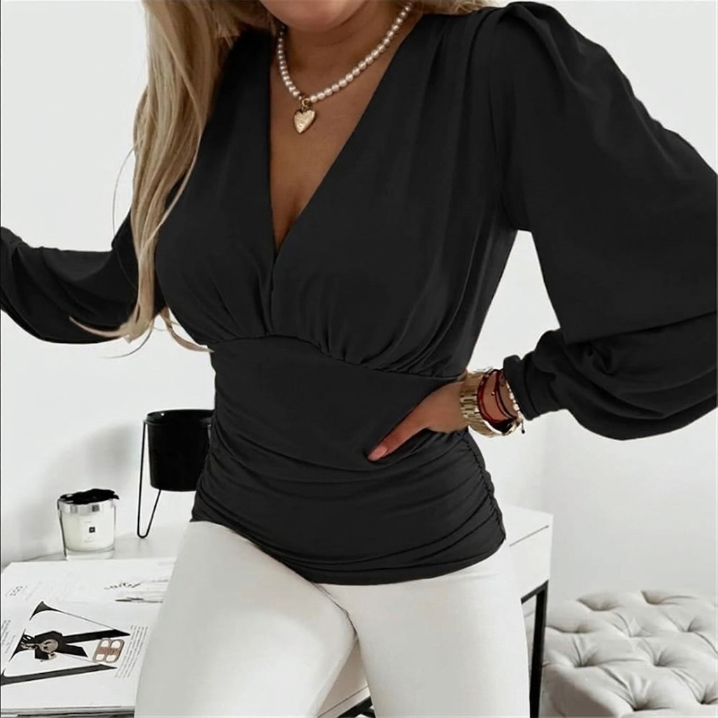 Blusa negra drapeada TL
